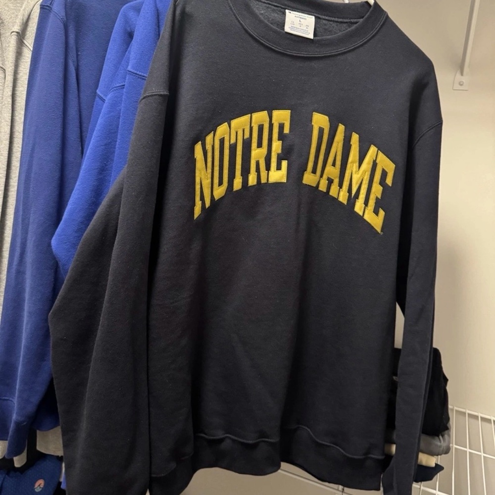Champion Black Crewneck Sweatshirt with Yellow "Notre Dame" Arch